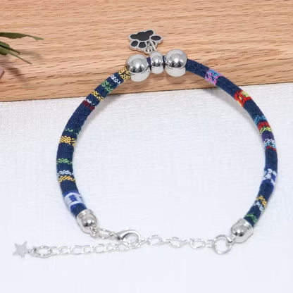 Stylish Pet Paw Collar for Cats & Dogs – Durable, Adjustable Design with Cute Black Paw Print Pendant