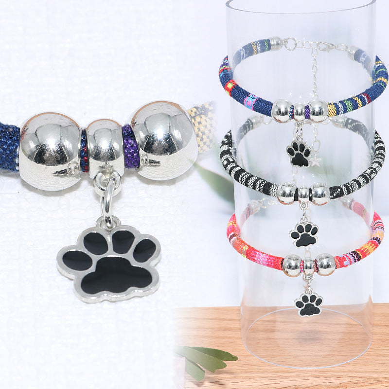 Stylish Pet Paw Collar for Cats & Dogs – Durable, Adjustable Design with Cute Black Paw Print Pendant